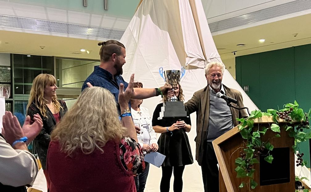 Eames with Trophy